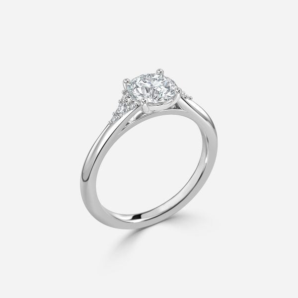 Aurelia Round Three Stone Moissanite Engagement Ring