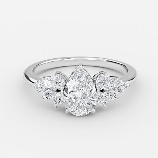 Clarity Pear Three Stone Moissanite Engagement Ring