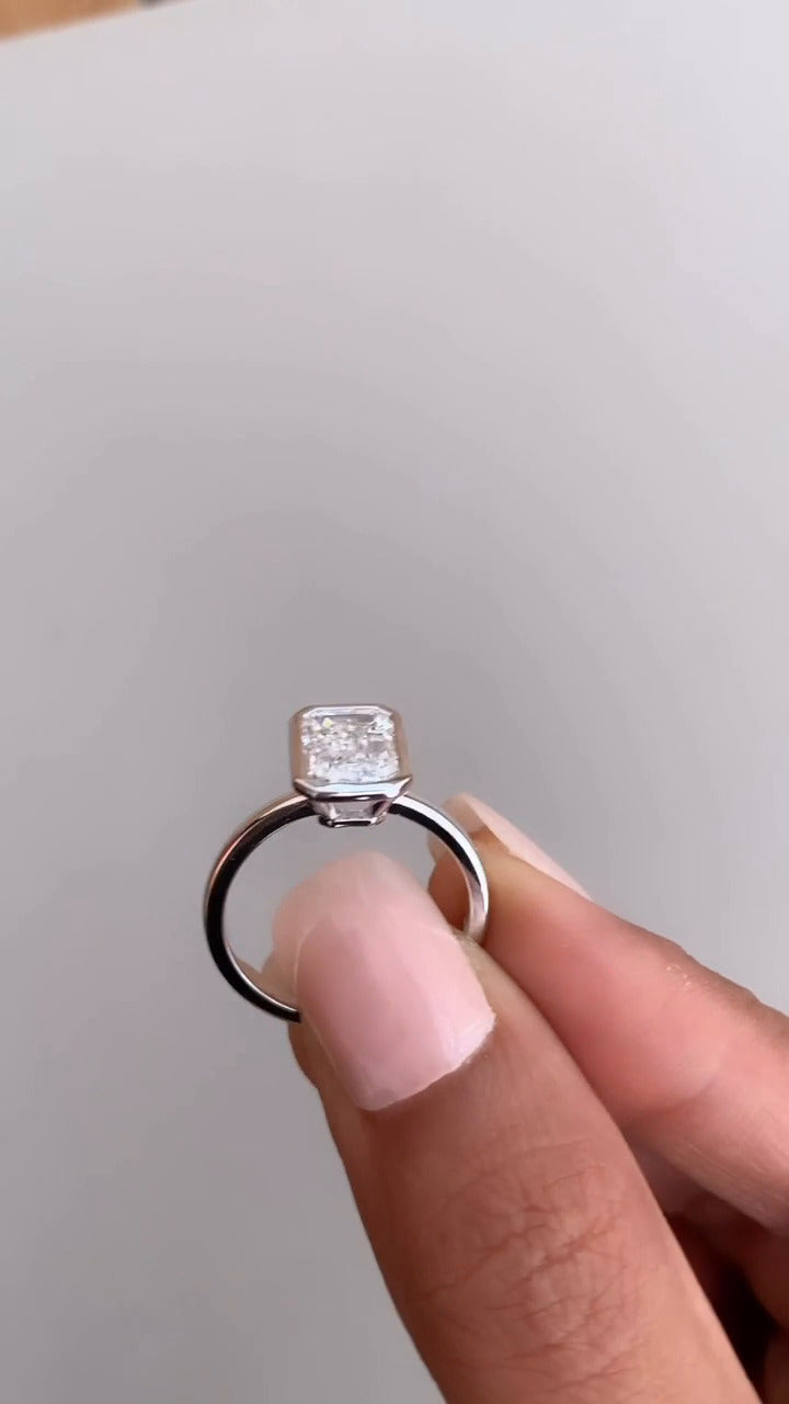 Alina Emerald Bezel Moissanite Engagement Ring