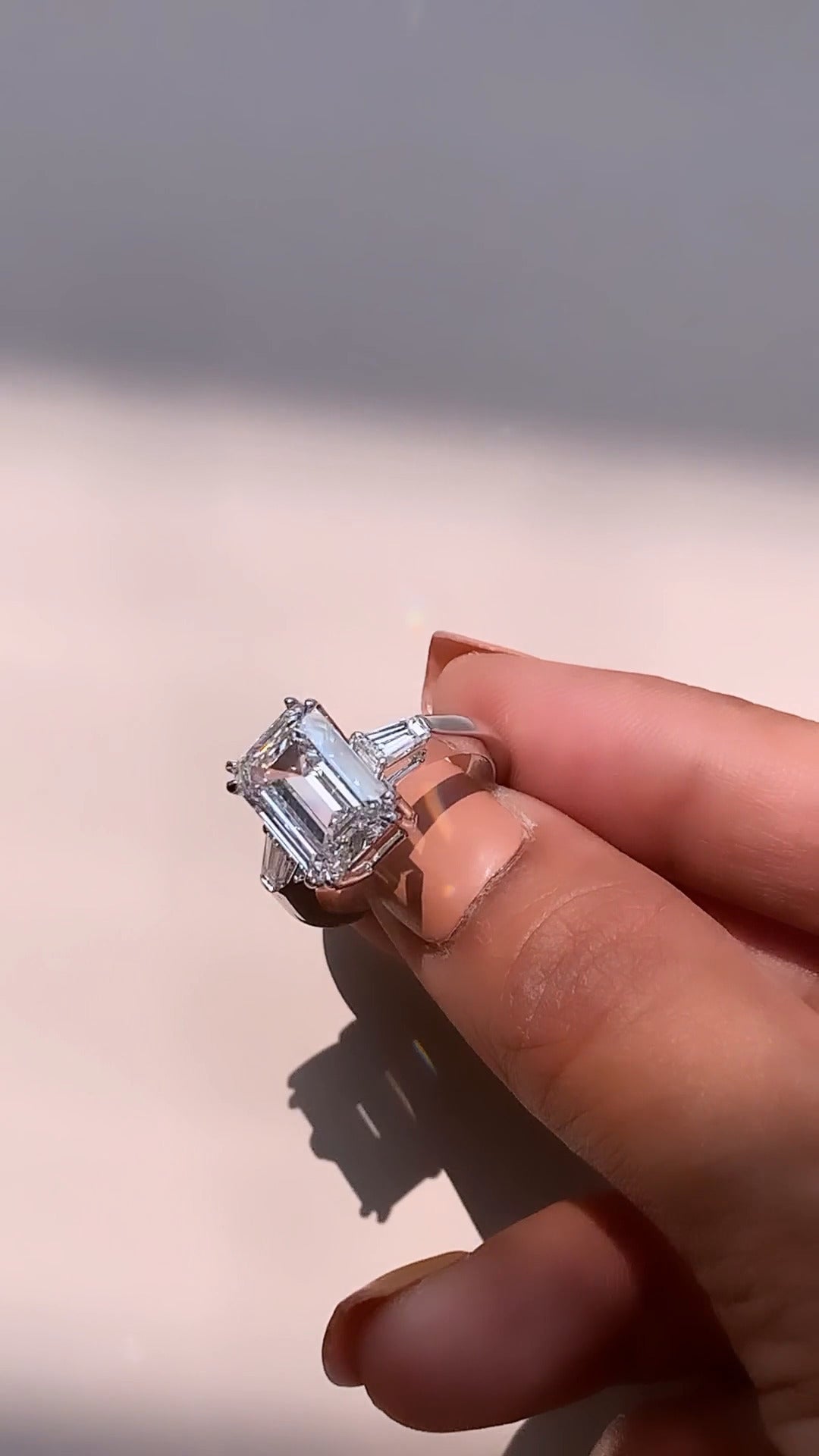 Calliope Emerald Three Stone Moissanite Engagement Ring