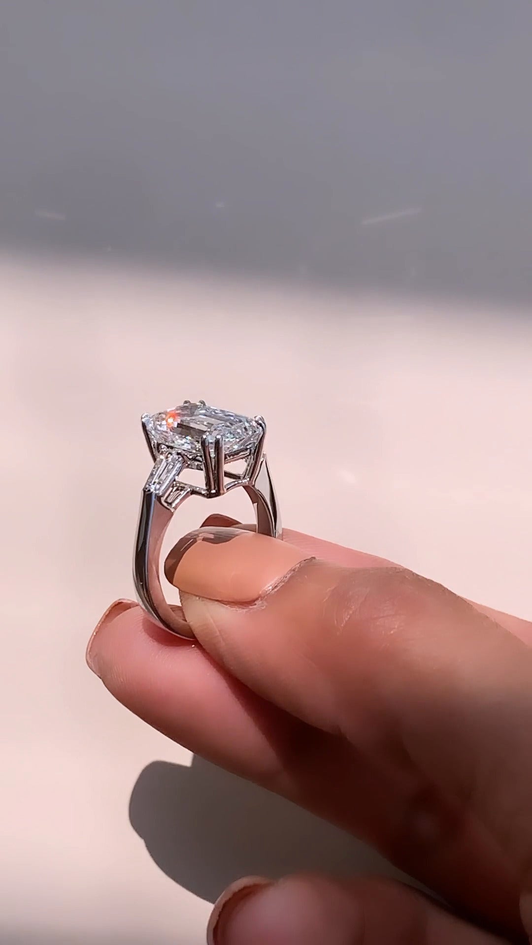 Calliope Emerald Three Stone Moissanite Engagement Ring