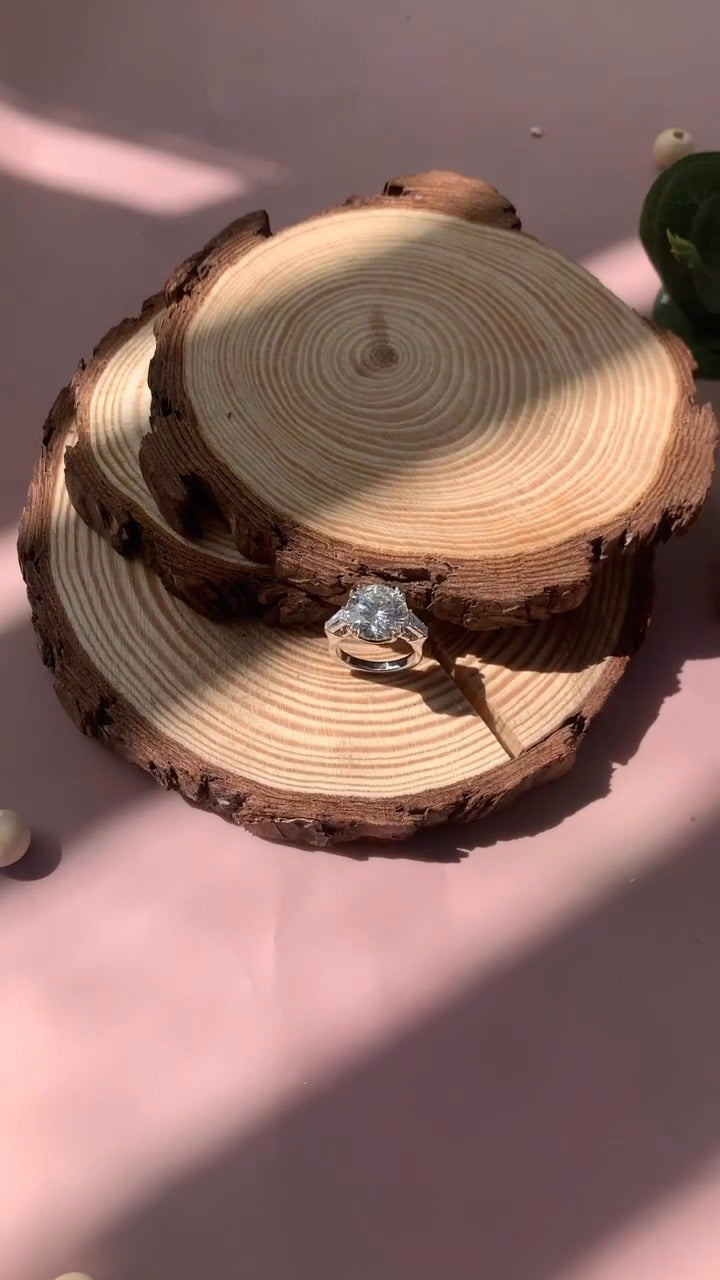 Calliope Round Three Stone Moissanite Engagement Ring