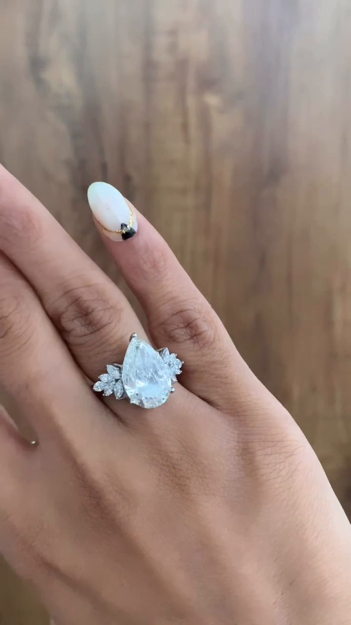 Clarity Pear Three Stone Moissanite Engagement Ring