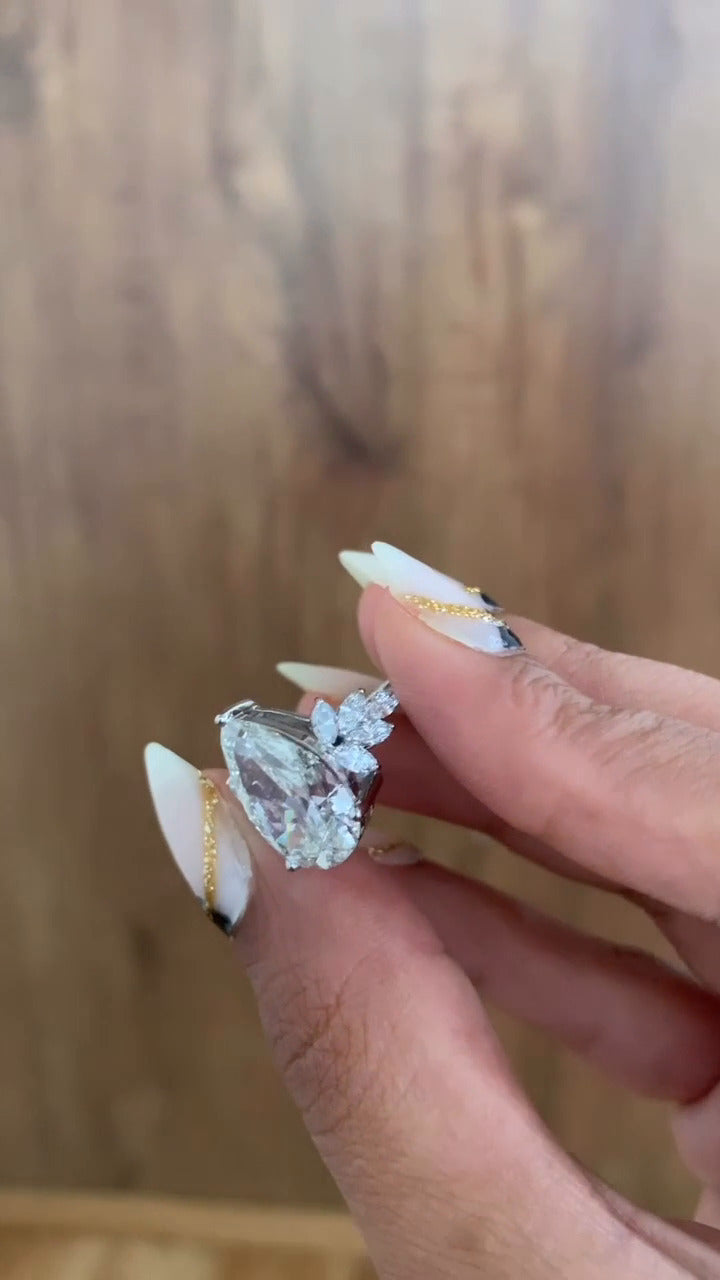 Clarity Pear Three Stone Moissanite Engagement Ring
