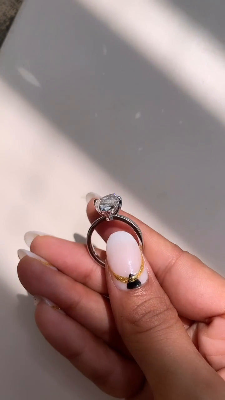Dasha Marquise Solitaire Moissanite Engagement Ring