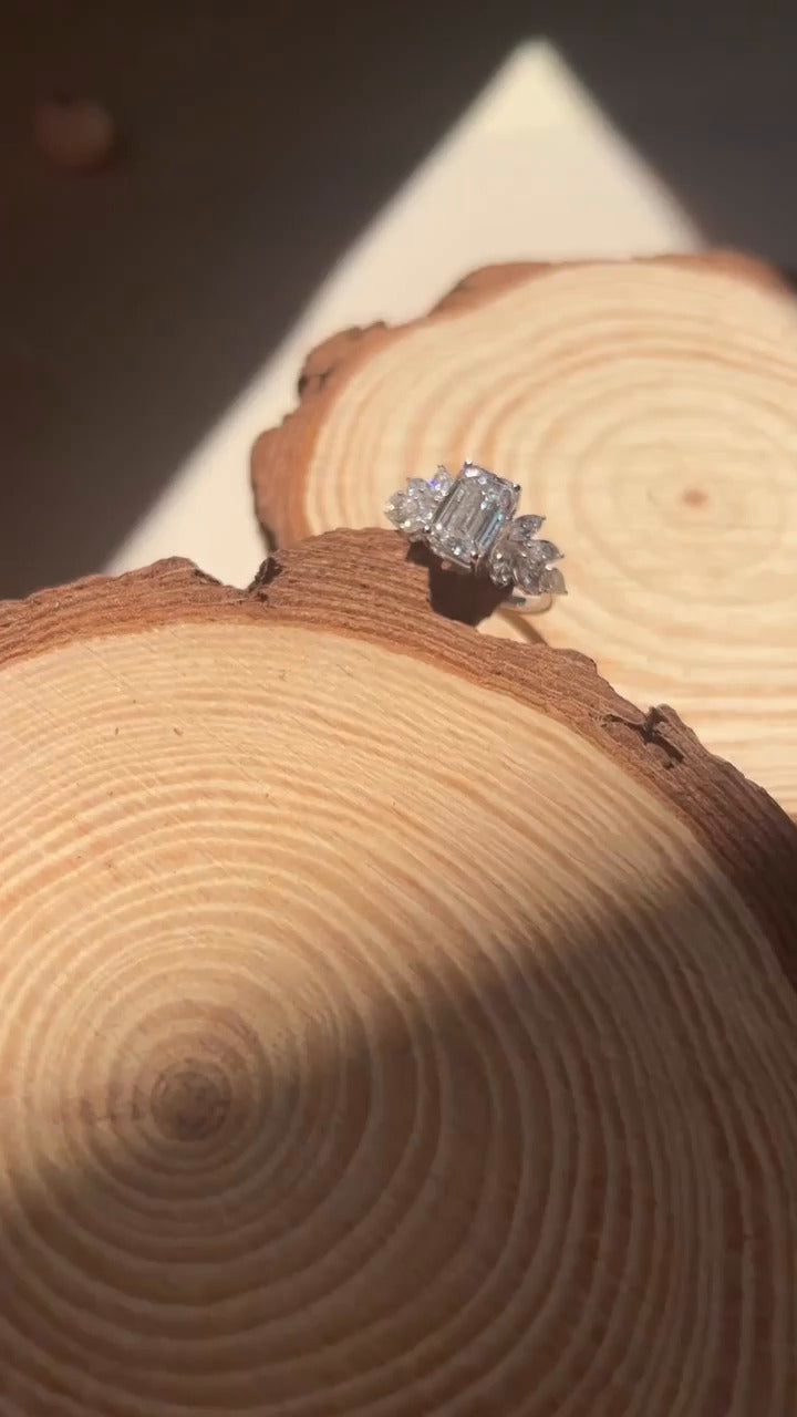 Galatea Emerald Three Stone Moissanite Engagement Ring