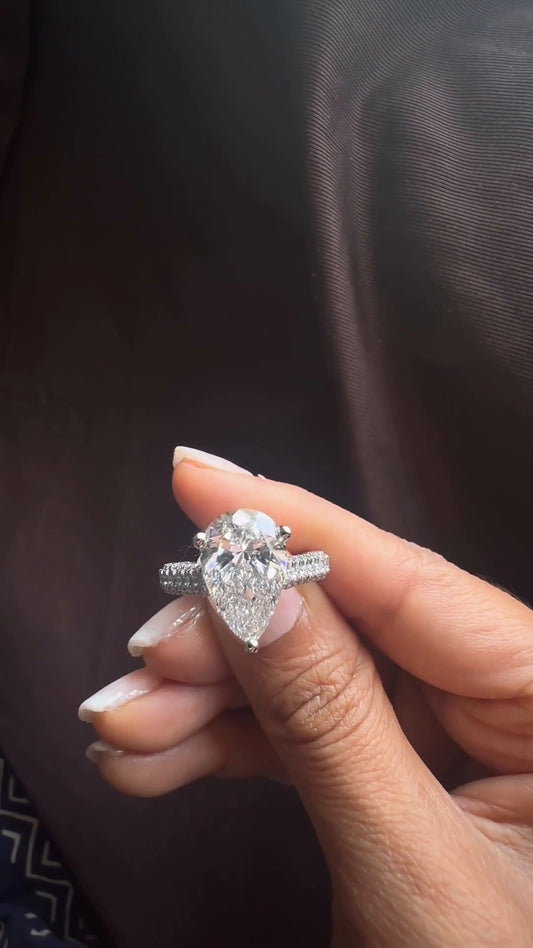 Kalaya Pear Hidden Halo Moissanite Engagement Ring