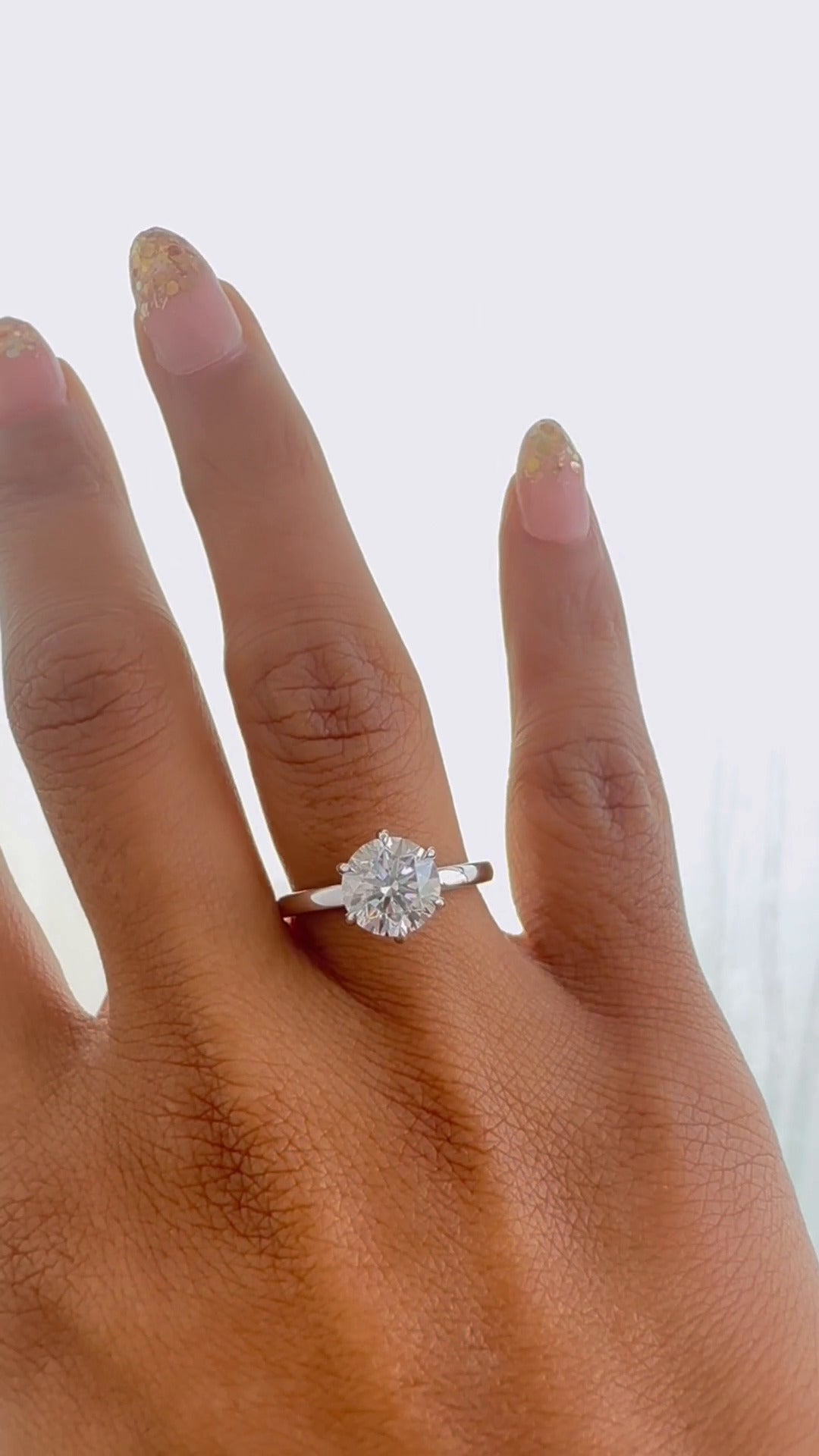 Magda Round Solitaire Moissanite Engagement Ring