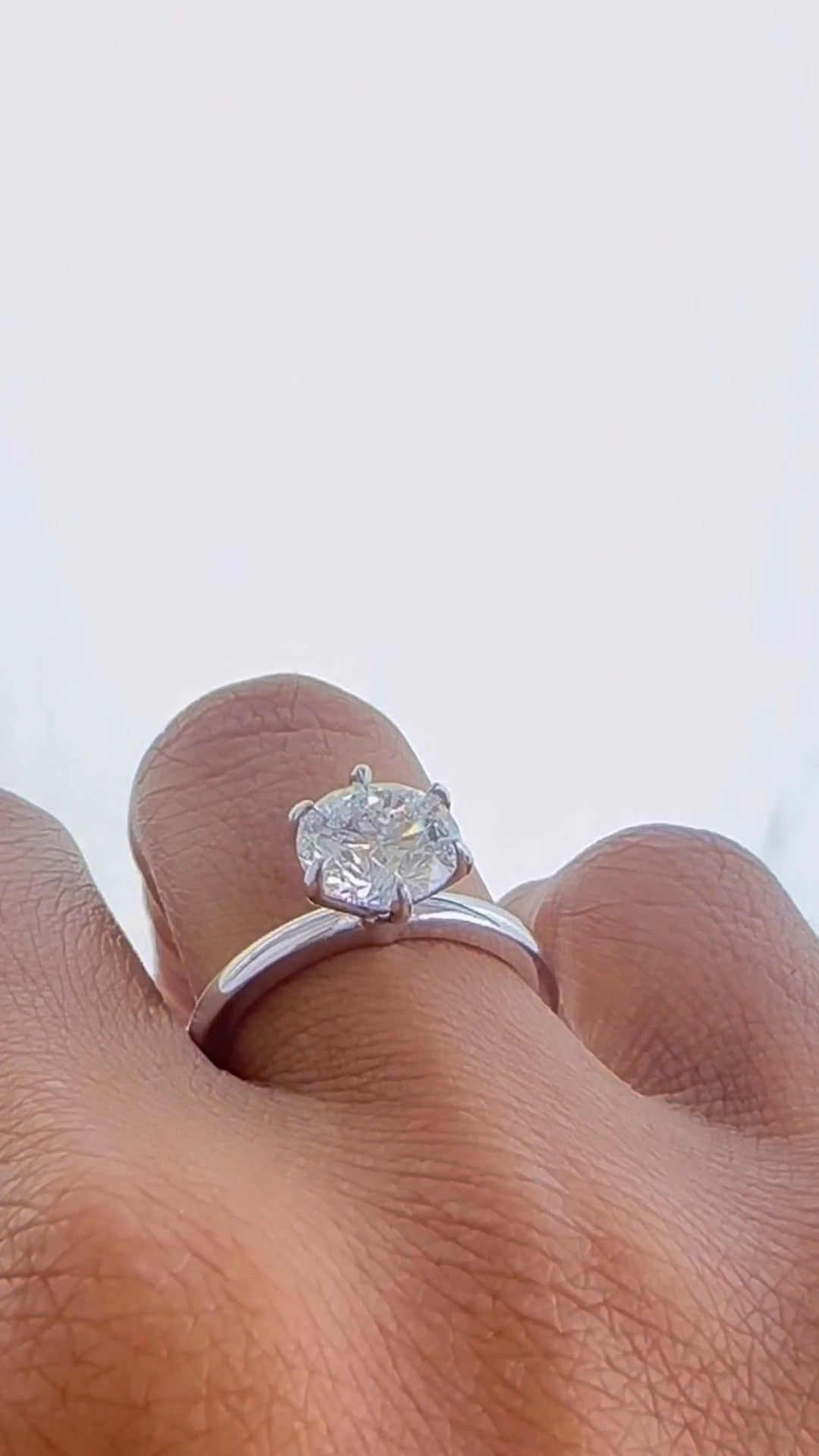 Magda Round Solitaire Moissanite Engagement Ring