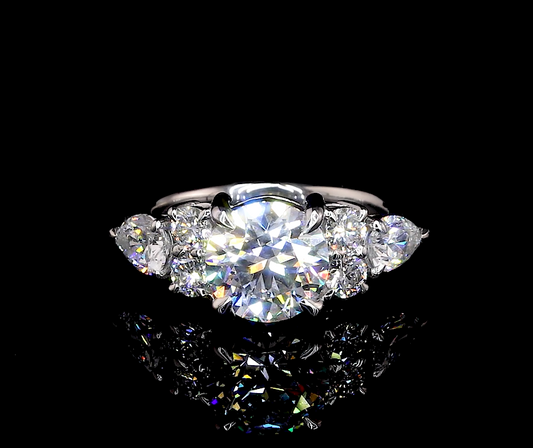Carmel Round Three Stone Moissanite Engagement Ring
