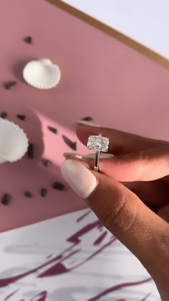 Simone Plain Emerald Solitaire Moissanite Engagement Ring