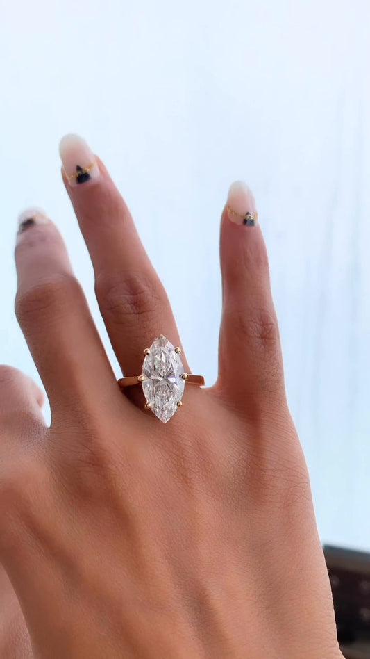 Thea Marquise Solitaire Moissanite Engagement Ring