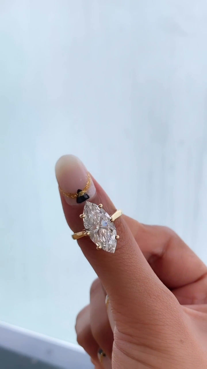 Thea Marquise Solitaire Moissanite Engagement Ring