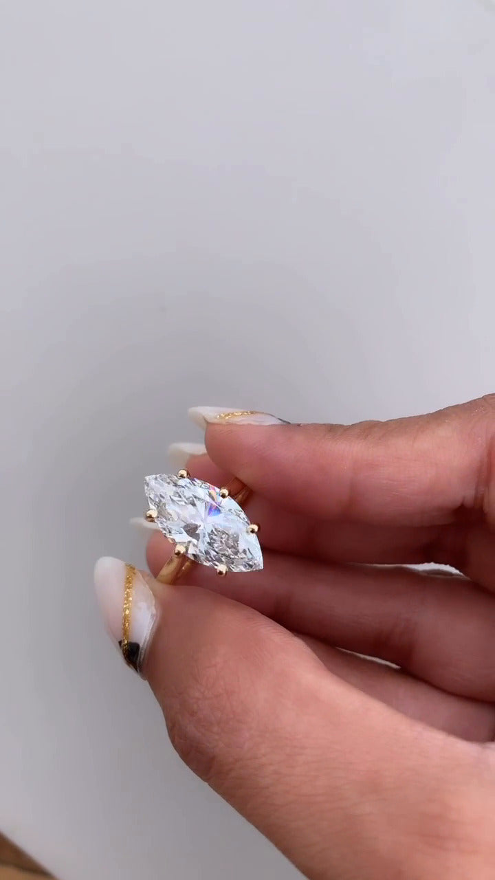 Thea Marquise Solitaire Moissanite Engagement Ring