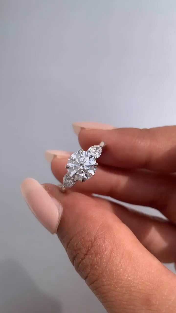Tierney Round Three Stone Moissanite Engagement Ring