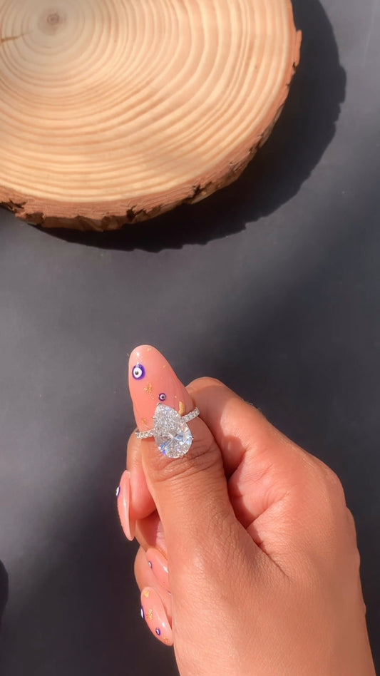 Yati Pear Diamond Band Moissanite Engagement Ring