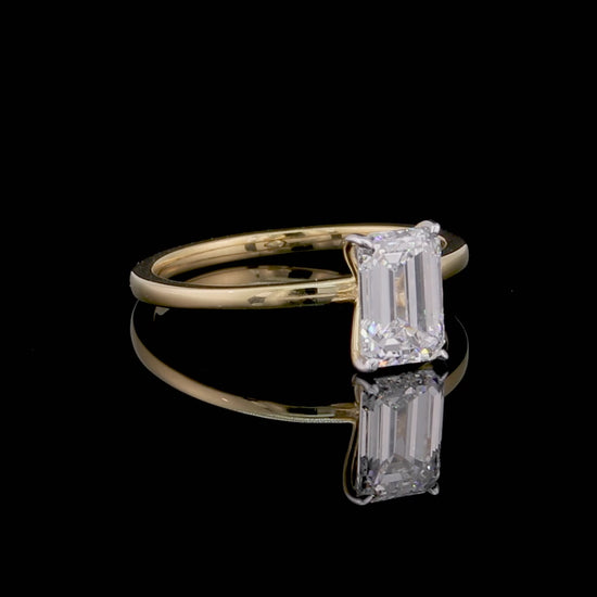 Emerald Solitaire Engagement Ring
