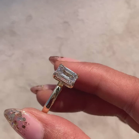 Emerald Solitaire Engagement Ring