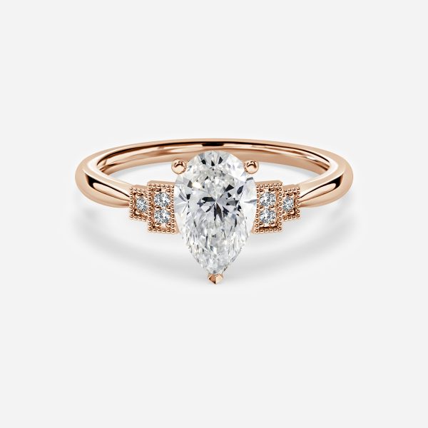 Isley Pear Three Stone Moissanite Engagement Ring