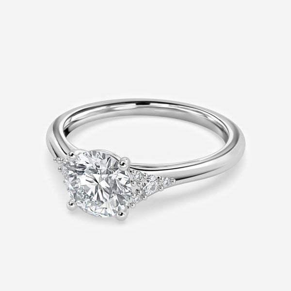 Aurelia Round Three Stone Moissanite Engagement Ring