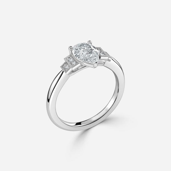 Isley Pear Three Stone Moissanite Engagement Ring